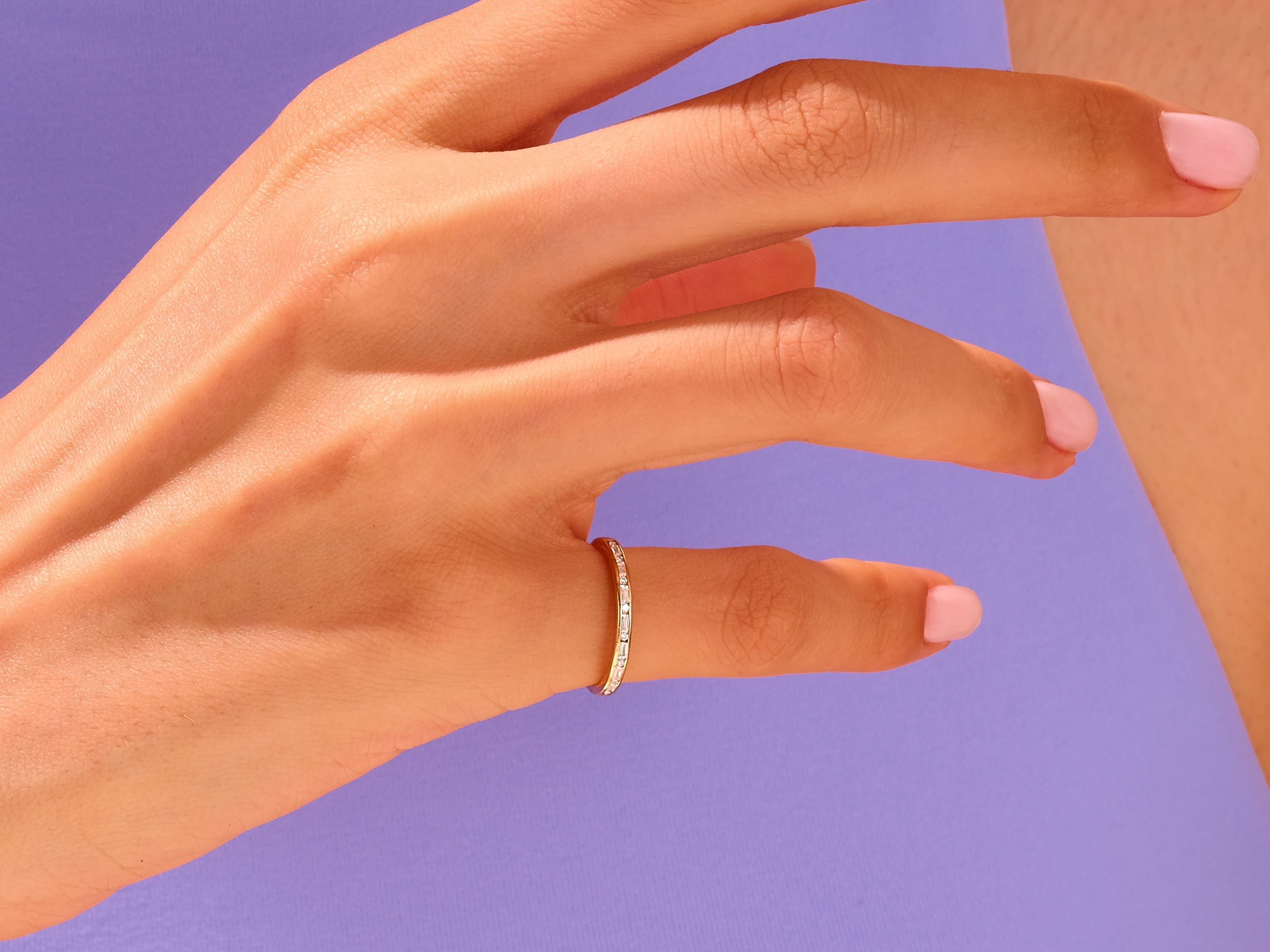Diamond band ring on hand, jewelry product photography