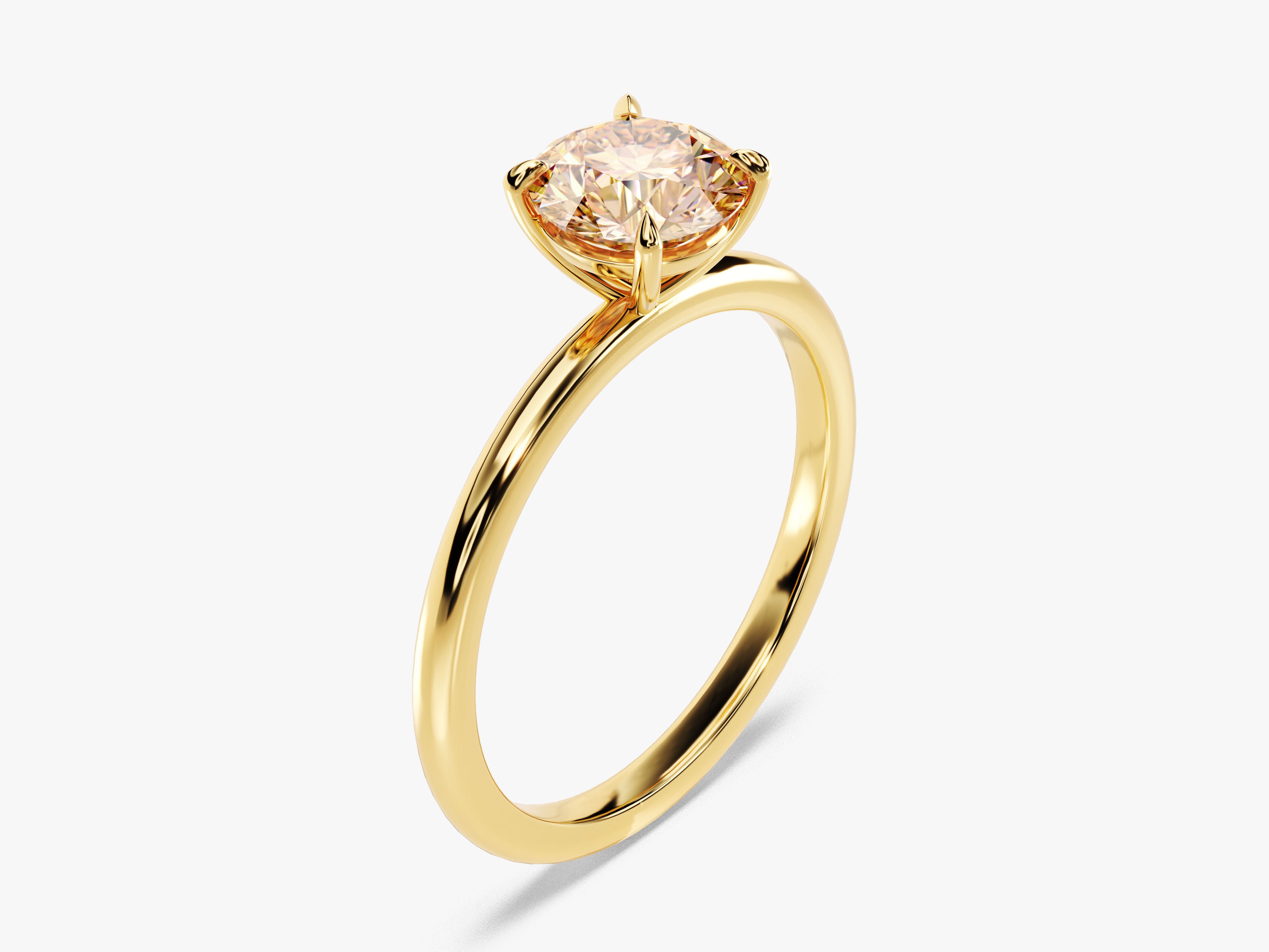 Gold ring with a sparkling champagne diamond engagement ring
