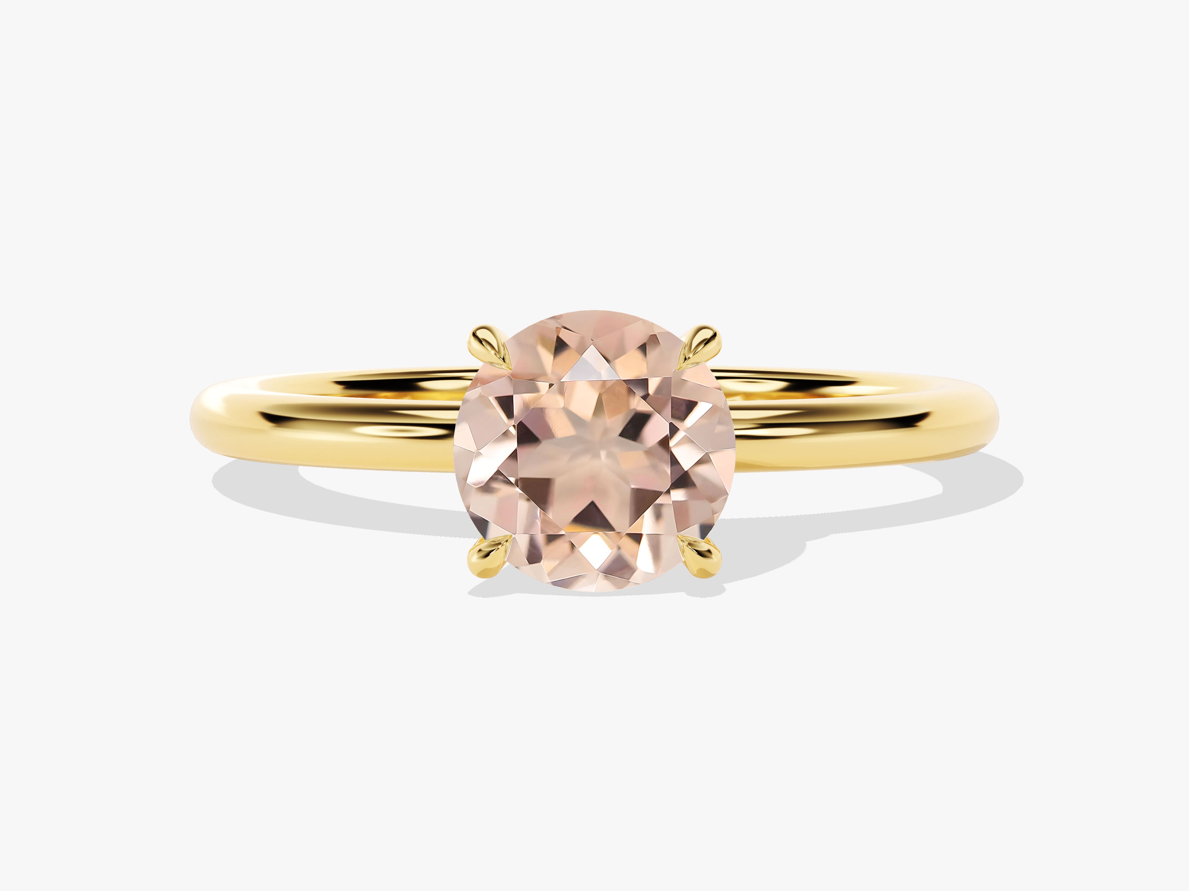 Oval morganite engagement ring in yellow gold setting