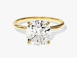 Gold ring with a large, brilliant cut diamond
