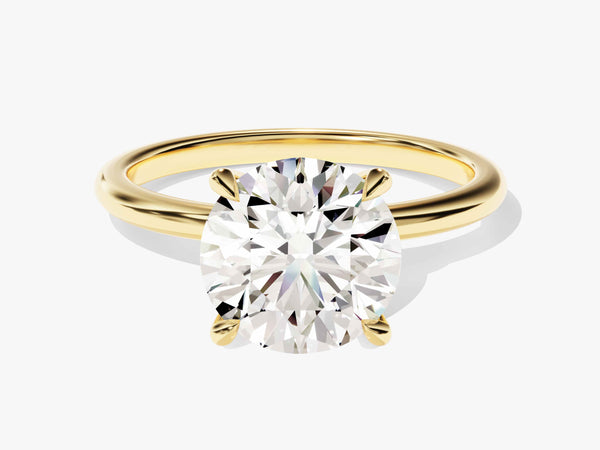 Gold ring with a large, brilliant cut diamond