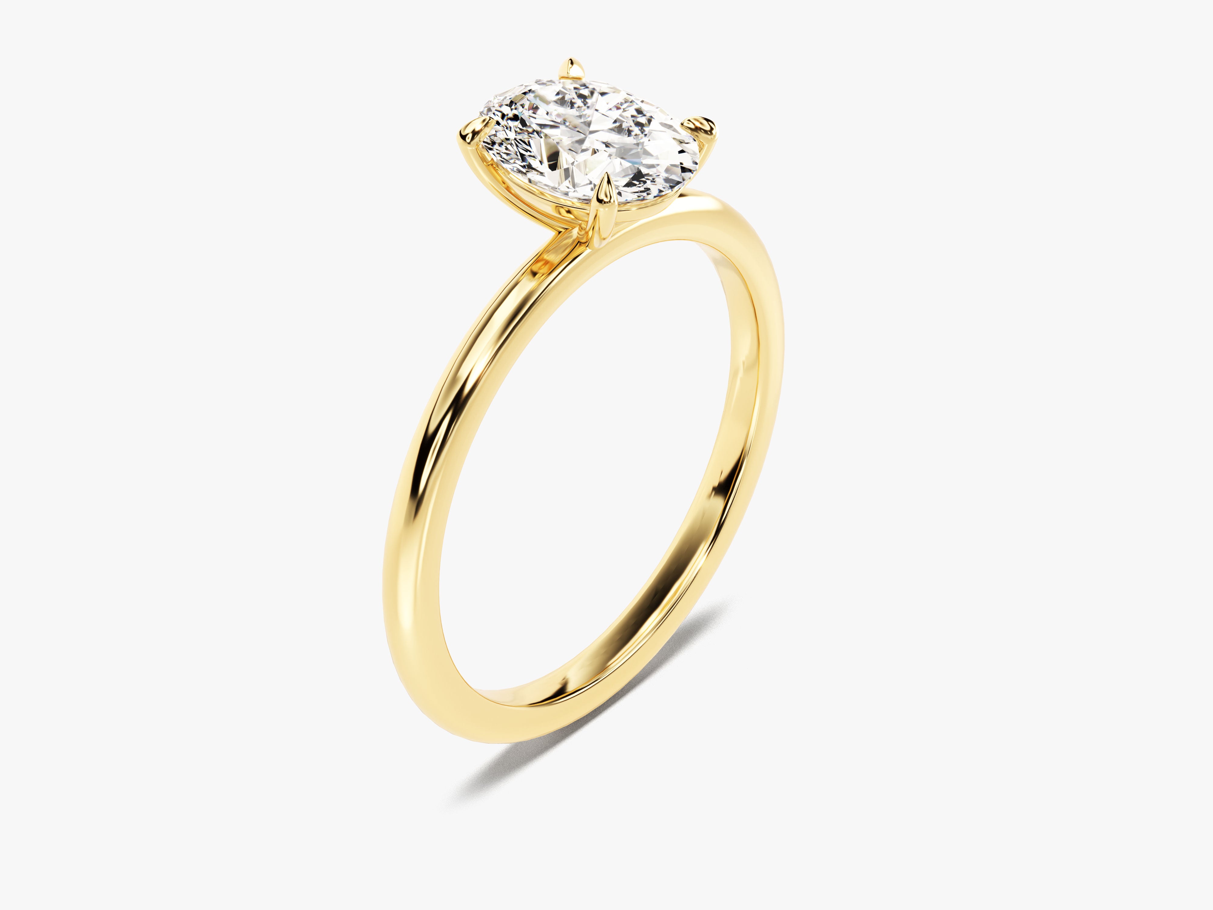 Gold oval diamond engagement ring for jewelry company