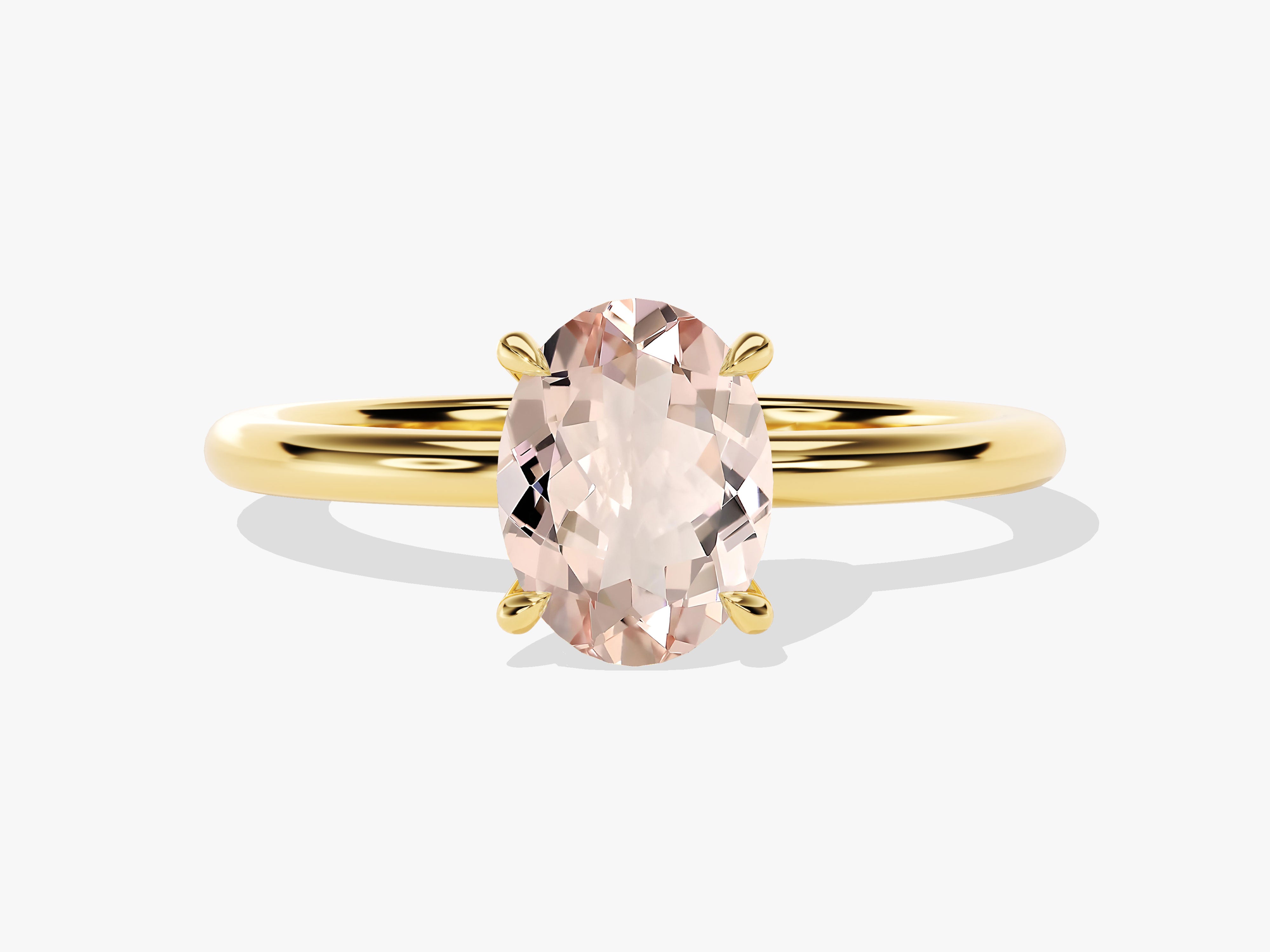 Oval morganite engagement ring in yellow gold setting