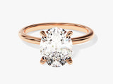 Oval diamond engagement ring in rose gold setting