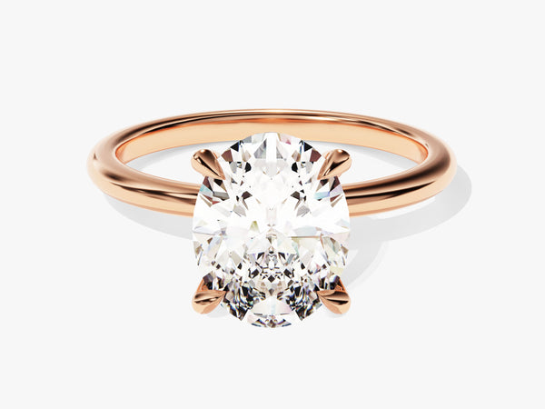 Oval diamond engagement ring in rose gold setting