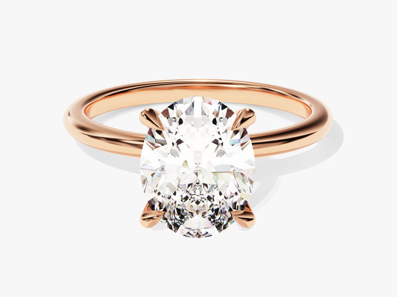 Oval diamond engagement ring in rose gold setting