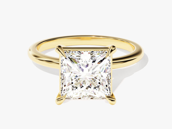 Princess cut diamond engagement ring in yellow gold