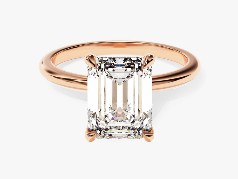 Emerald cut diamond ring in rose gold setting