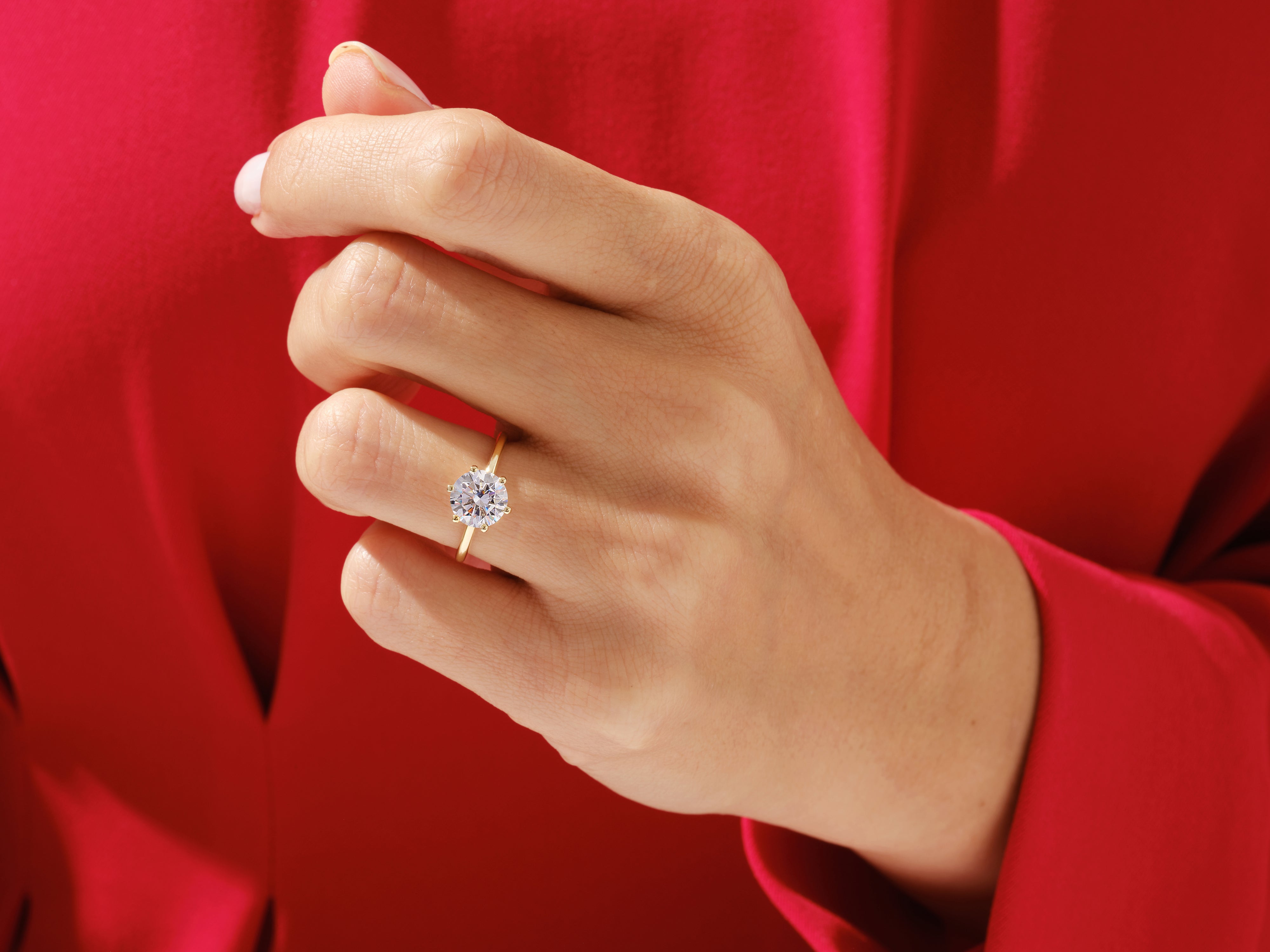 Diamond engagement ring on a hand, jewelry for women