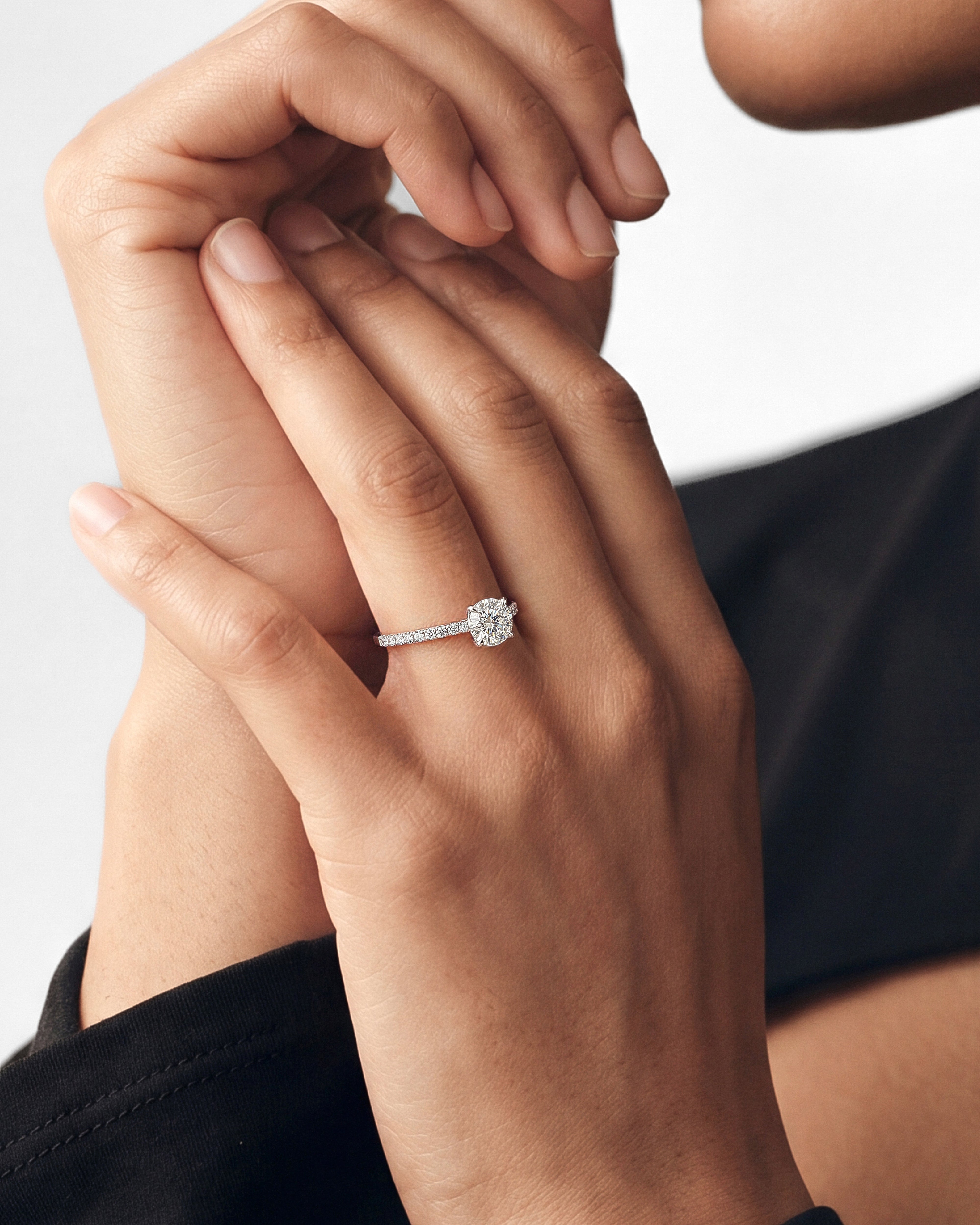 Cathedral Round Cut Moissanite Engagement Ring with Pave Set Side Stones (1.00 CT)