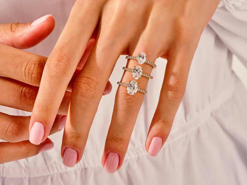 On Finger Two Carat Oval Diamond Cathedral Oval Cut Diamond