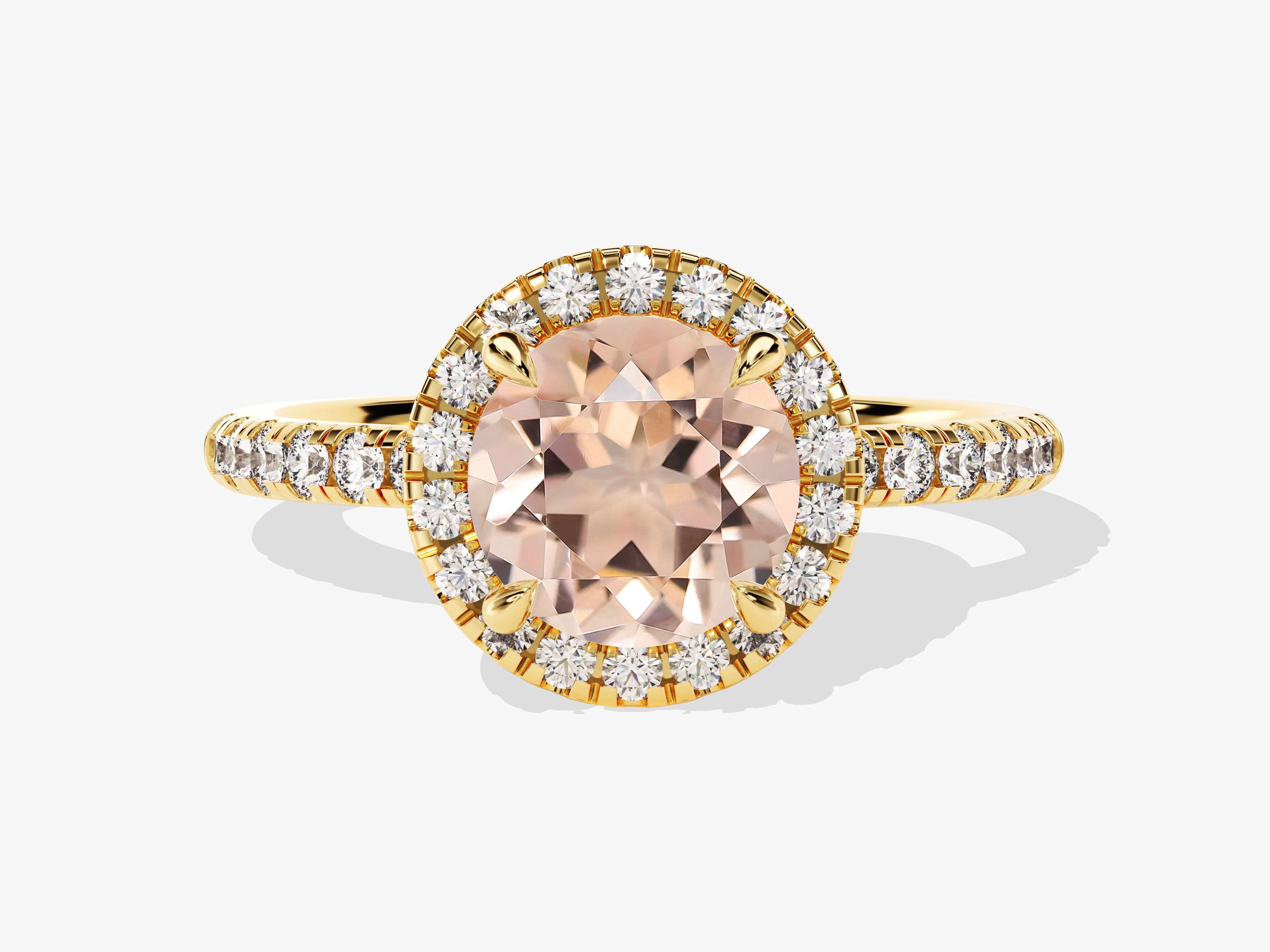 Gold halo ring with peach gemstone and diamonds