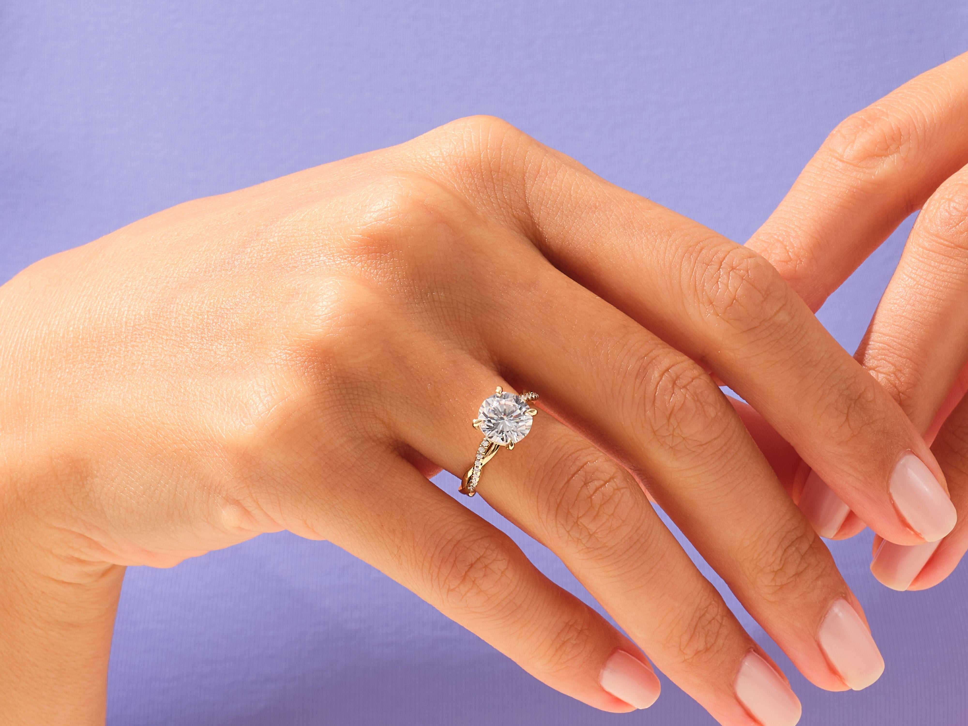 Diamond engagement ring on a woman's hand, jewelry