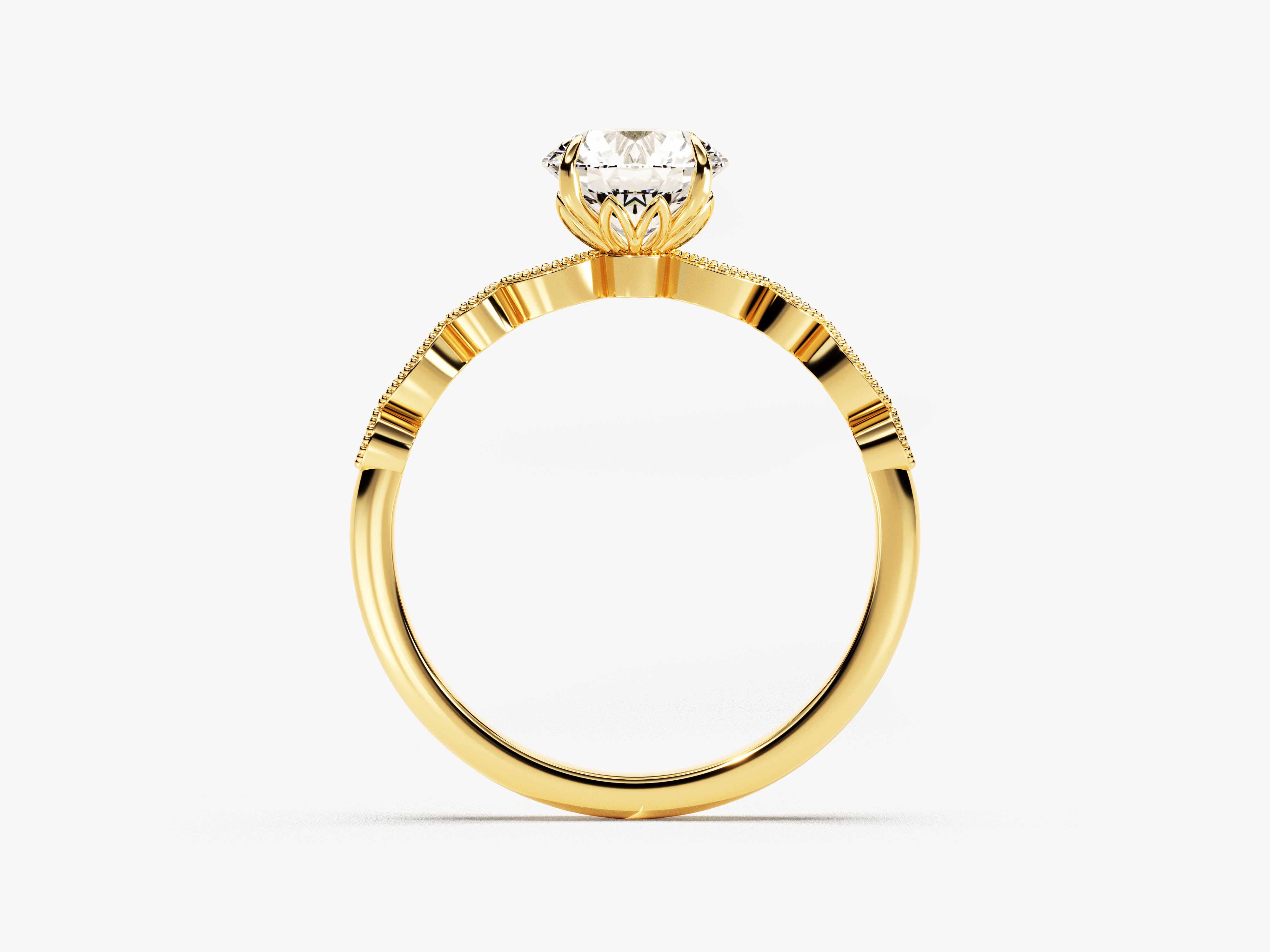 Gold diamond engagement ring with intricate band design