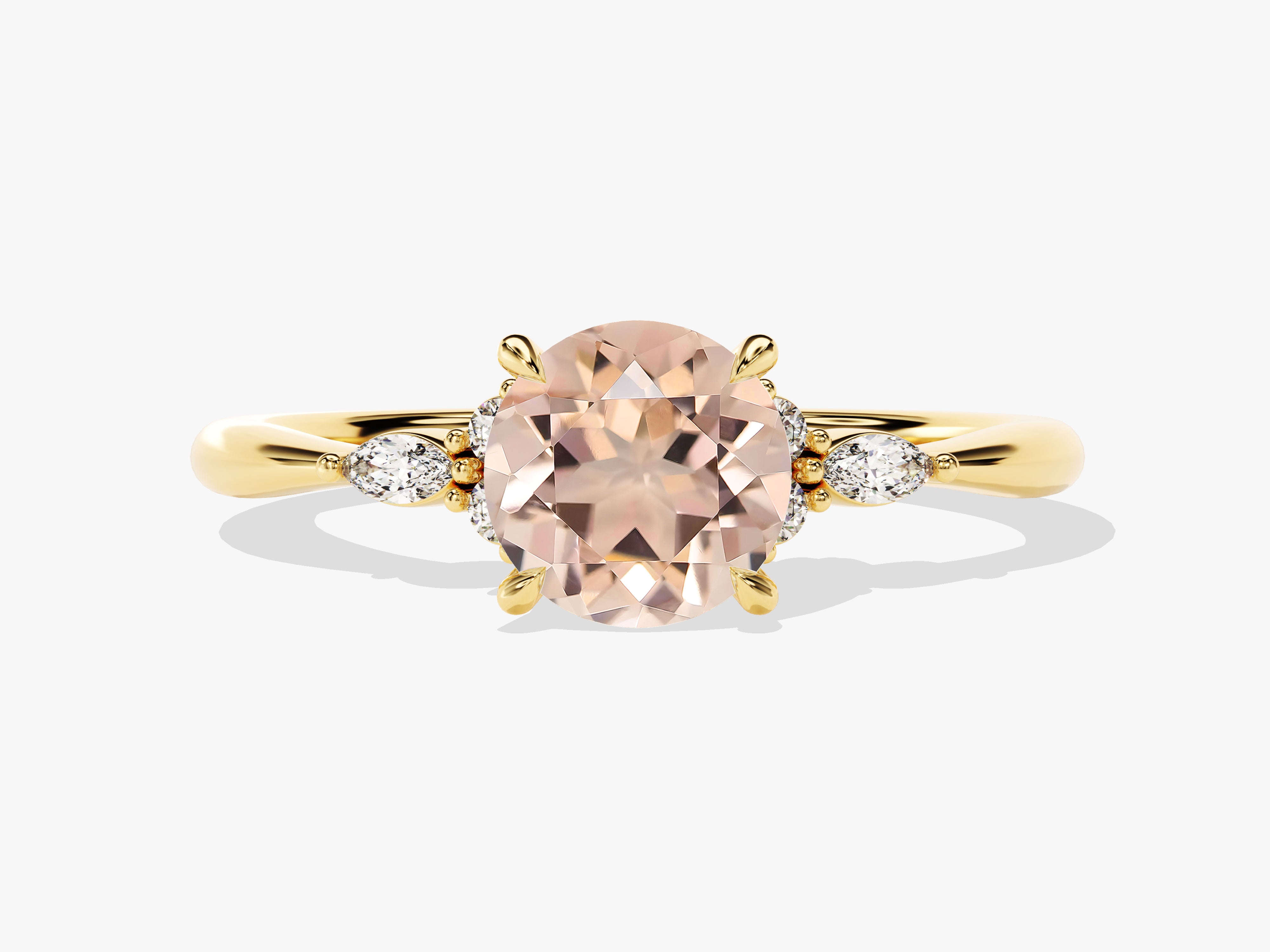 Gold ring with oval morganite and diamond accents