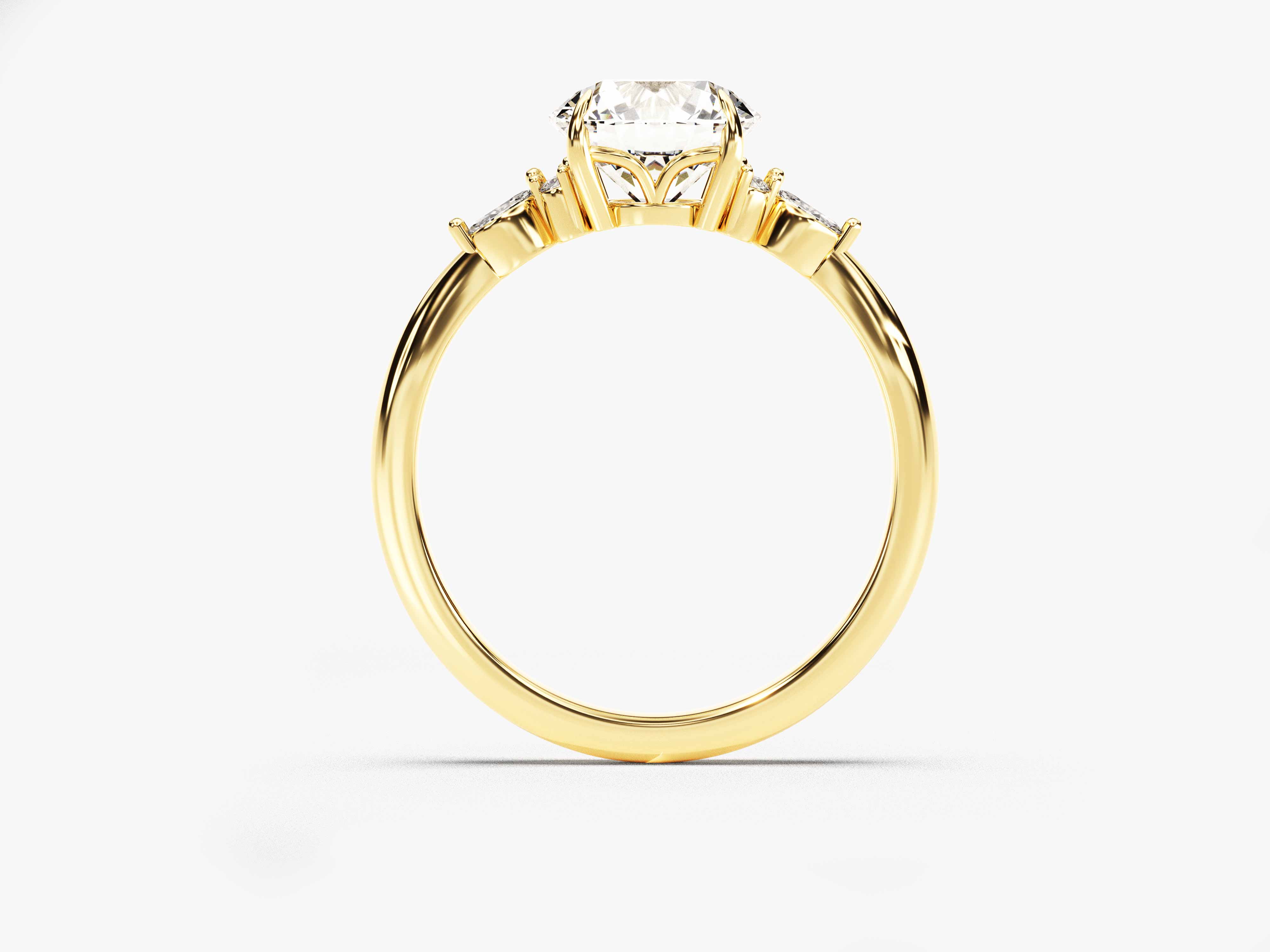 Gold diamond engagement ring with side stones