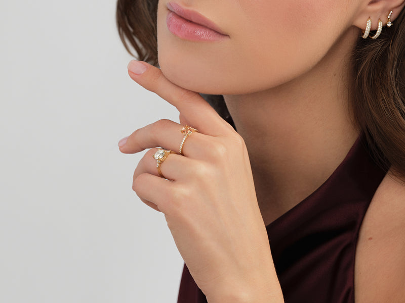 Sidestone Accent Gemstone Engagement Ring