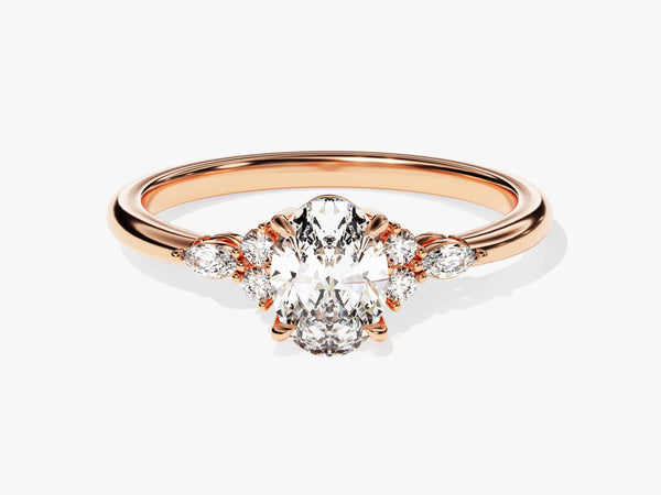 Rose gold oval diamond engagement ring with side stones