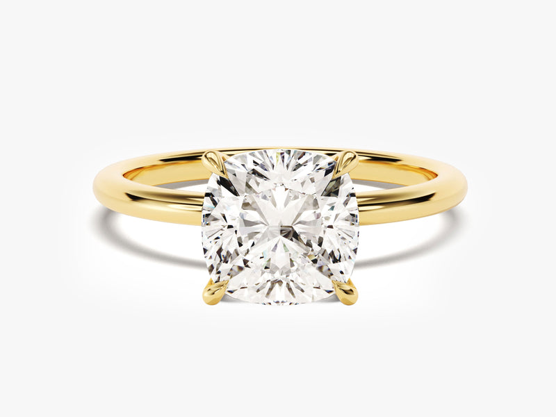 Gold ring with cushion cut diamond engagement ring