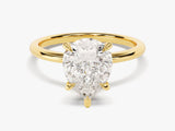 Pear cut diamond engagement ring in yellow gold