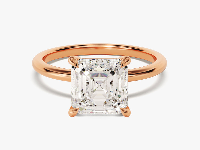 Rose gold ring with emerald cut diamond engagement ring