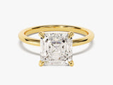 Emerald cut diamond engagement ring in yellow gold