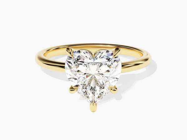 Gold ring with a heart-shaped diamond engagement ring