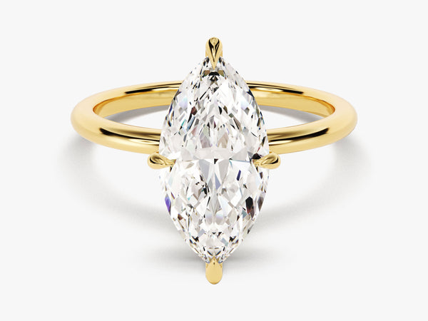Marquise diamond engagement ring in yellow gold