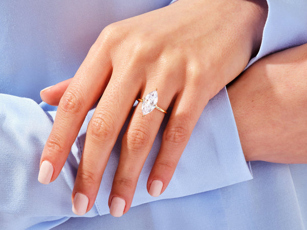 Marquise diamond ring on hand, luxury jewelry for women