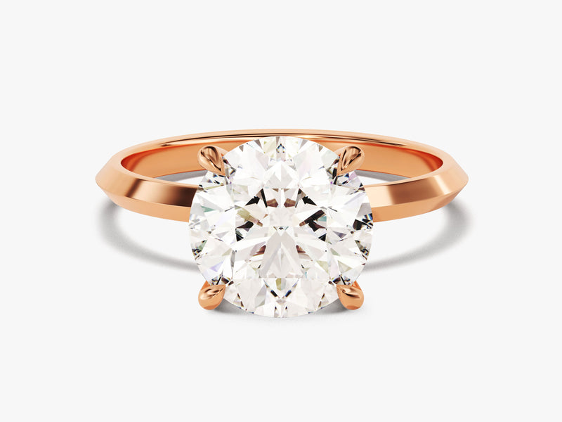Oval diamond engagement ring in rose gold setting