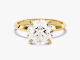 Oval diamond engagement ring in gold setting