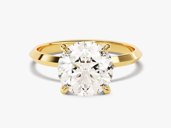 Oval diamond engagement ring in gold setting