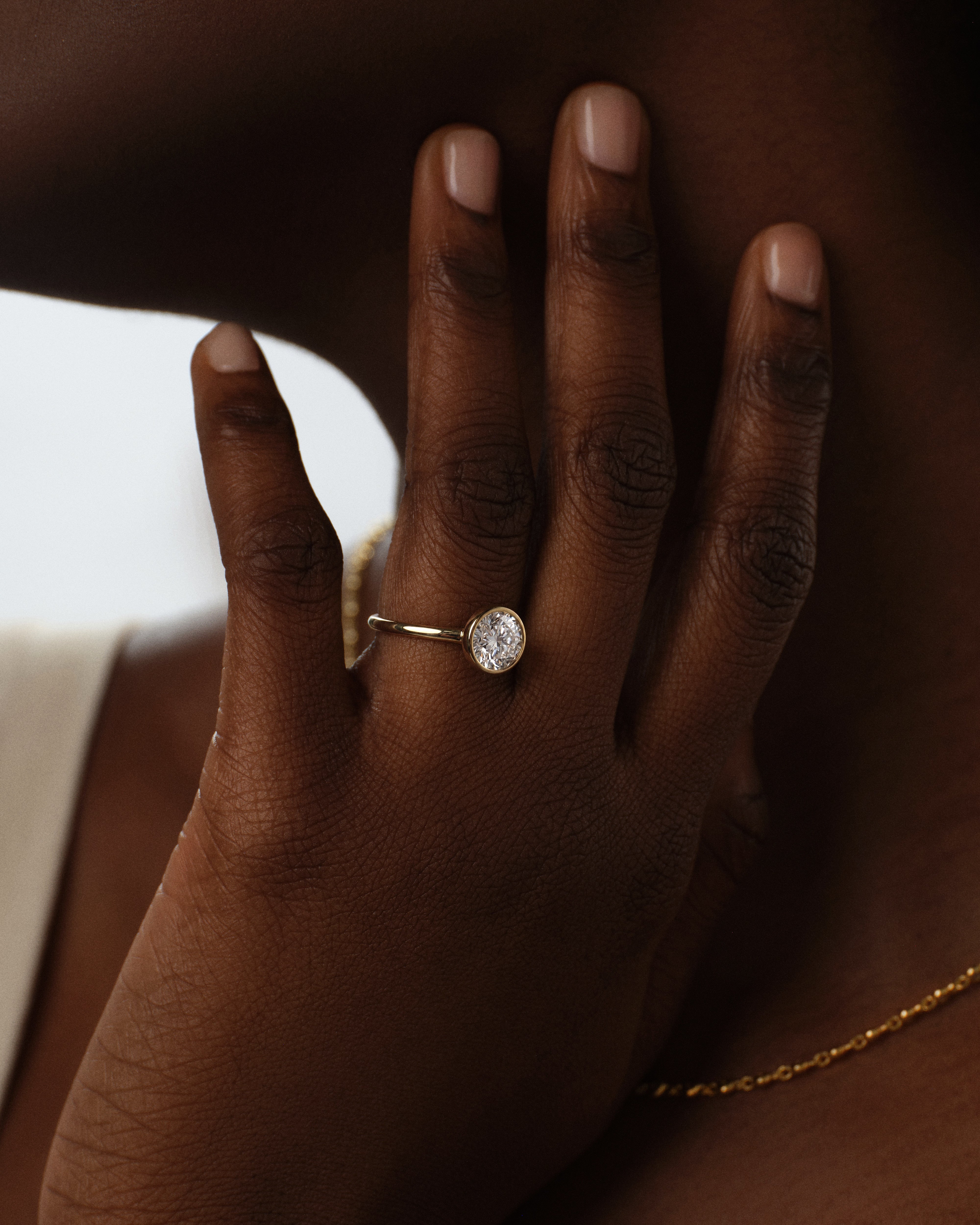 Round Bezel Solitaire Moissanite Engagement Ring (1.50 CT)