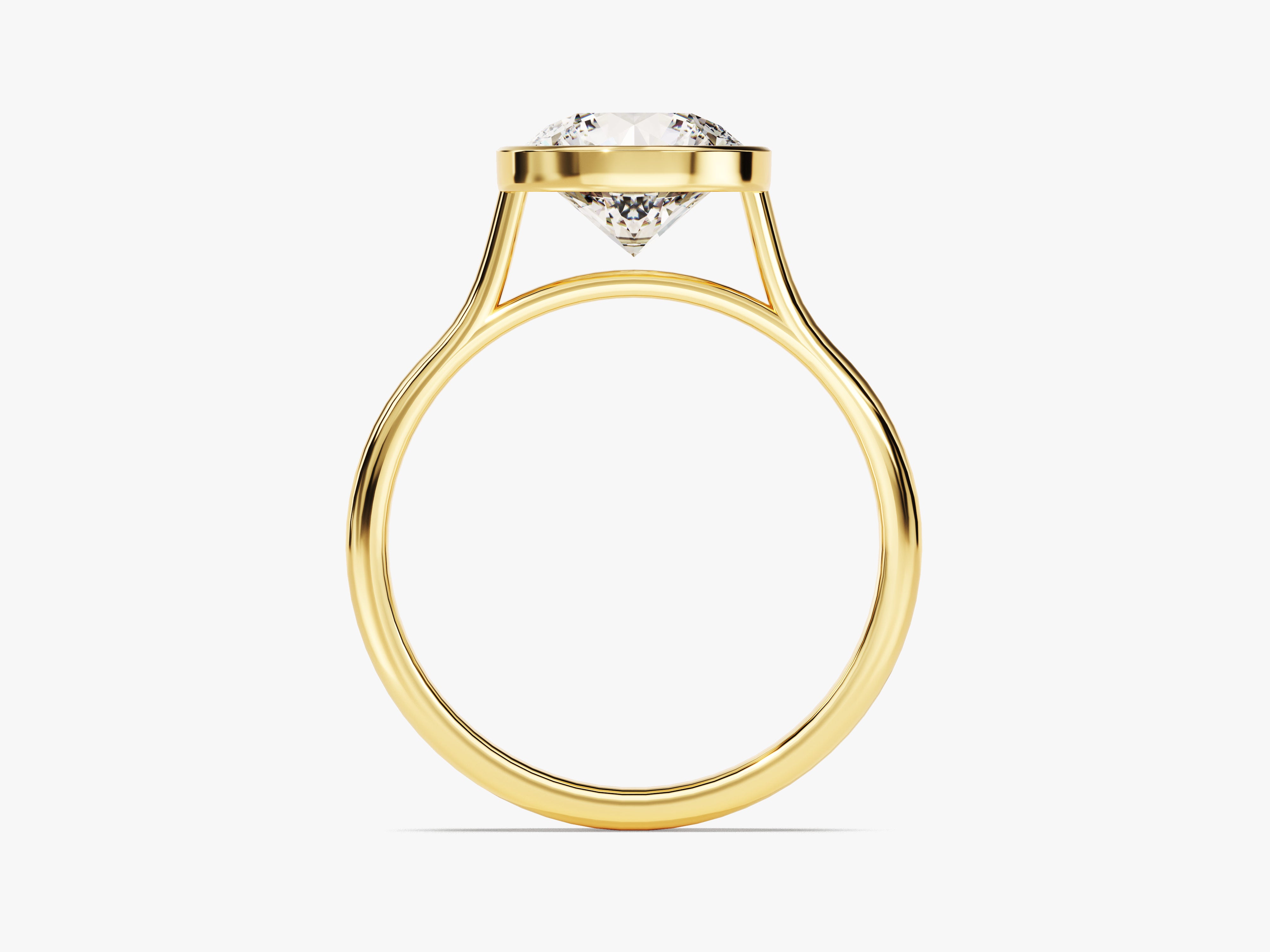 Gold ring with a bezel-set diamond, fine jewelry
