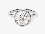 Oval diamond engagement ring, bezel set, white gold band
