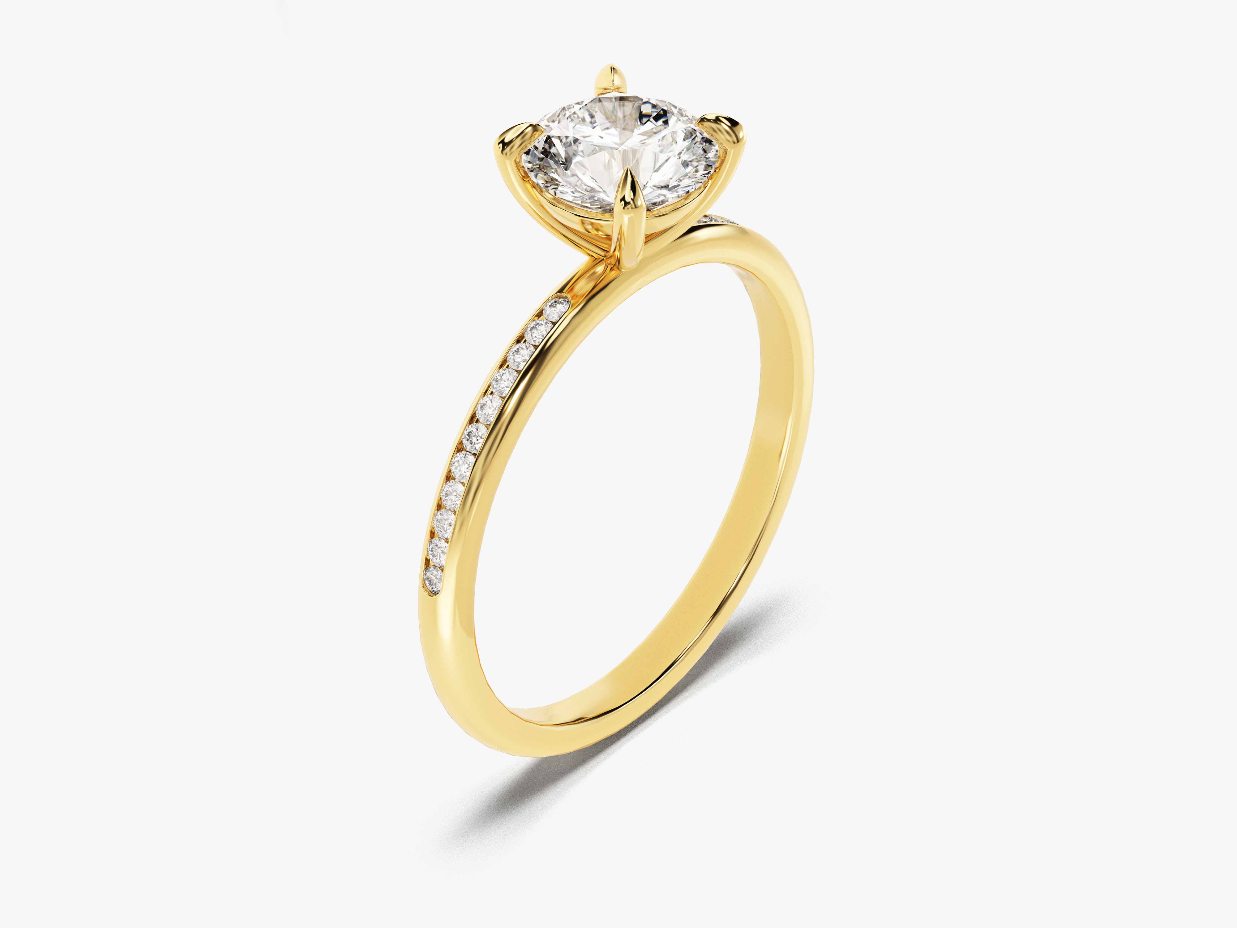 Gold diamond engagement ring with pavé band
