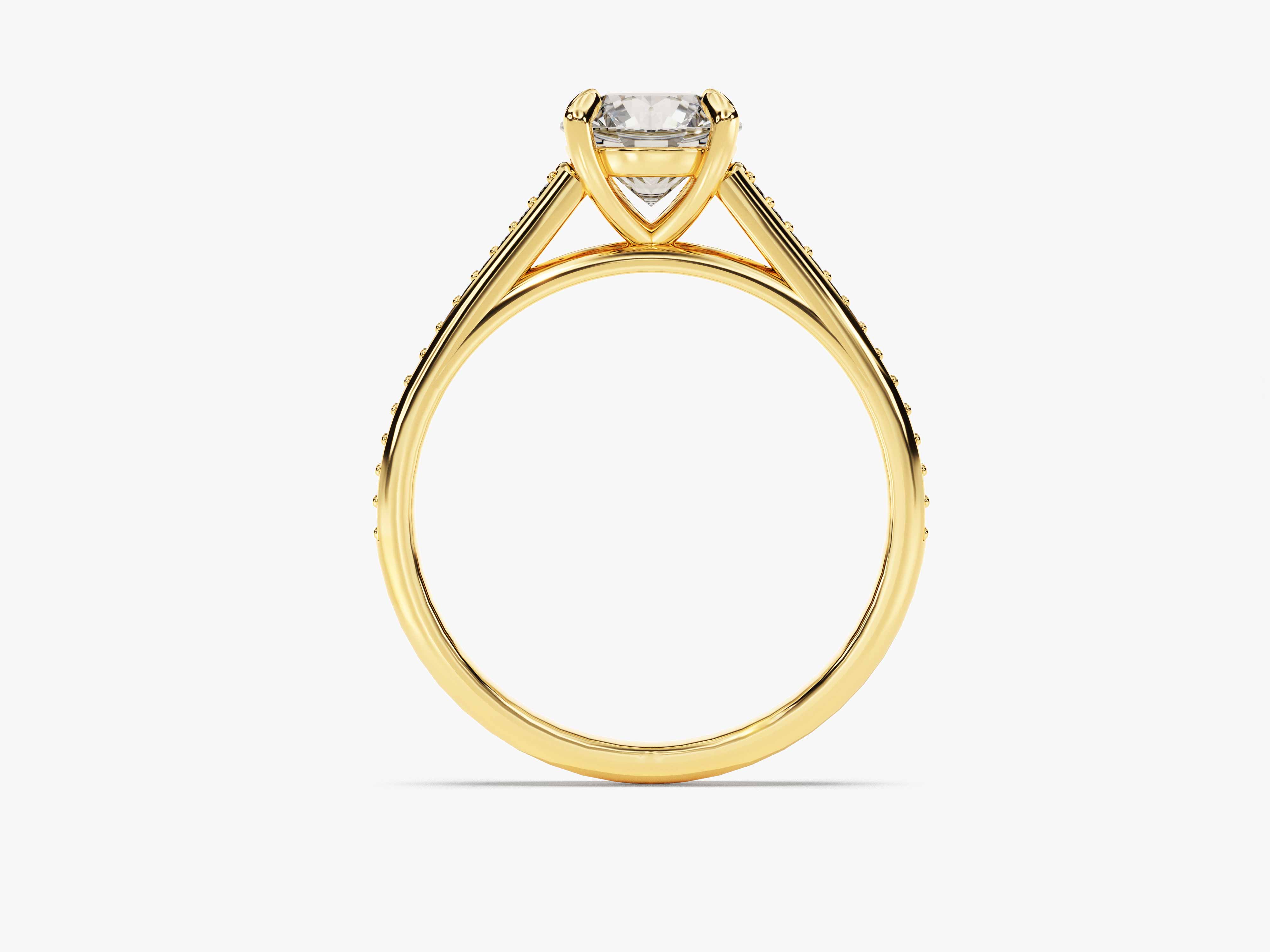 Gold diamond engagement ring with pavé band