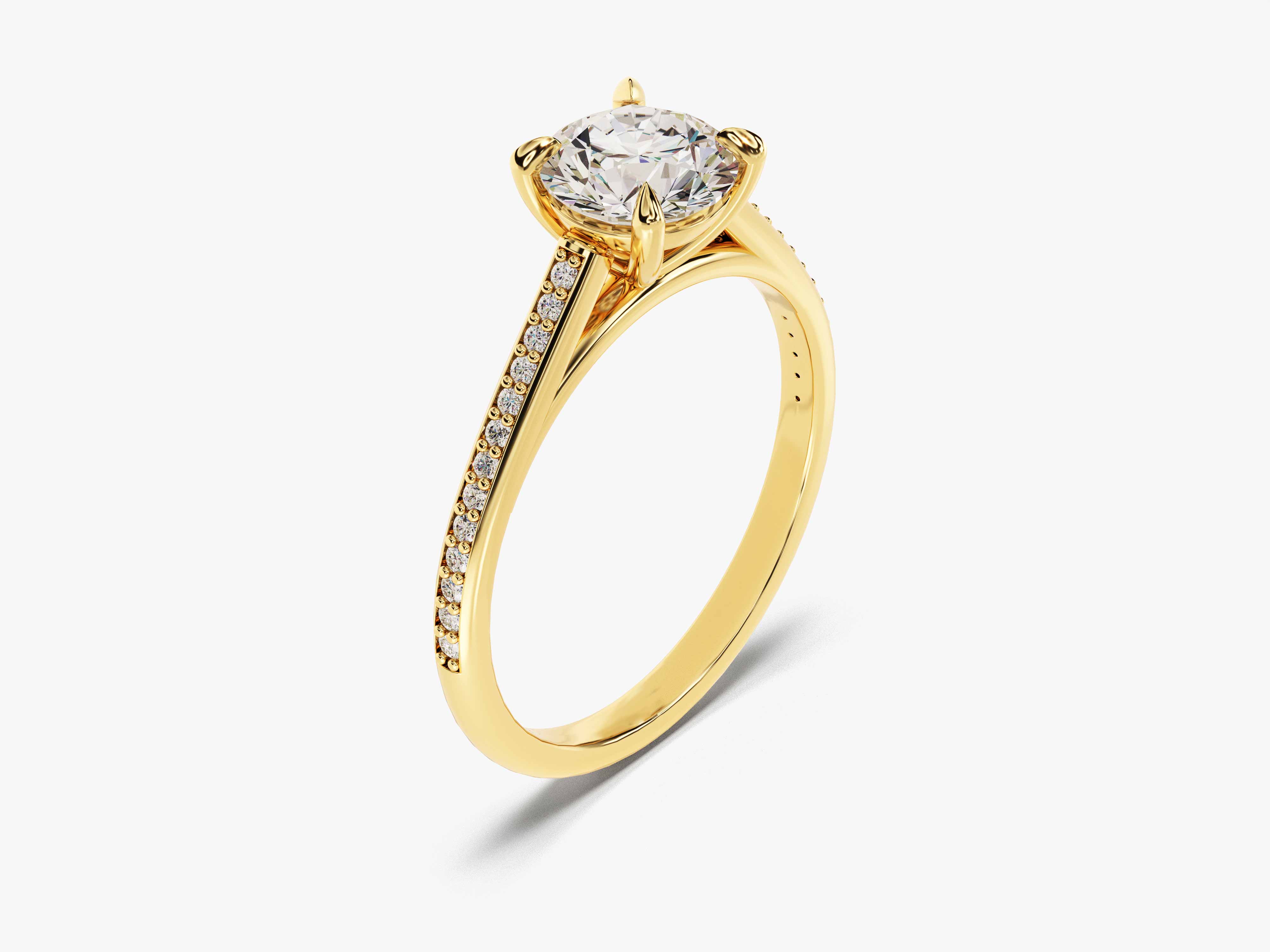 Gold diamond engagement ring with pave band