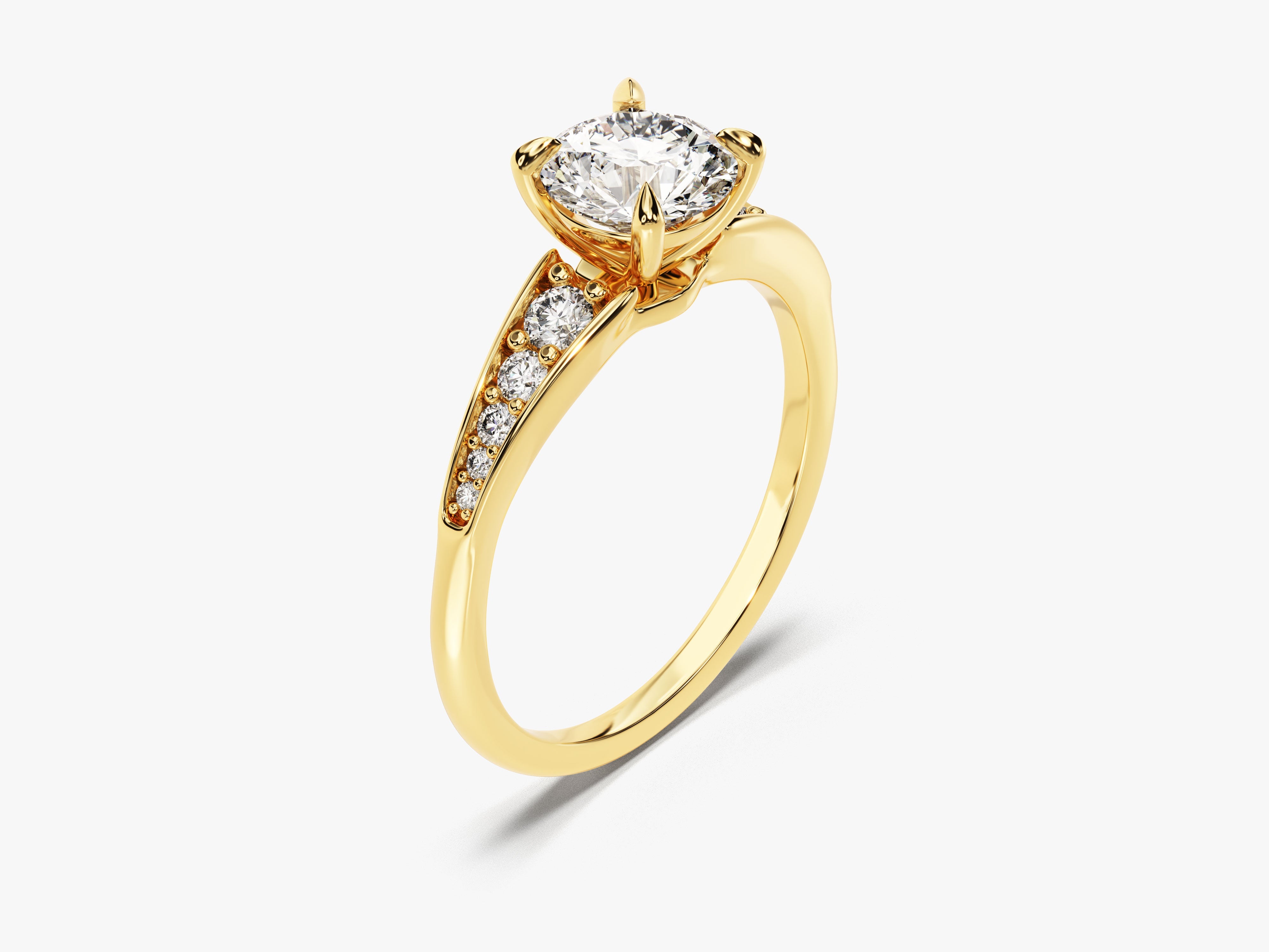 Gold diamond engagement ring with pave side stones
