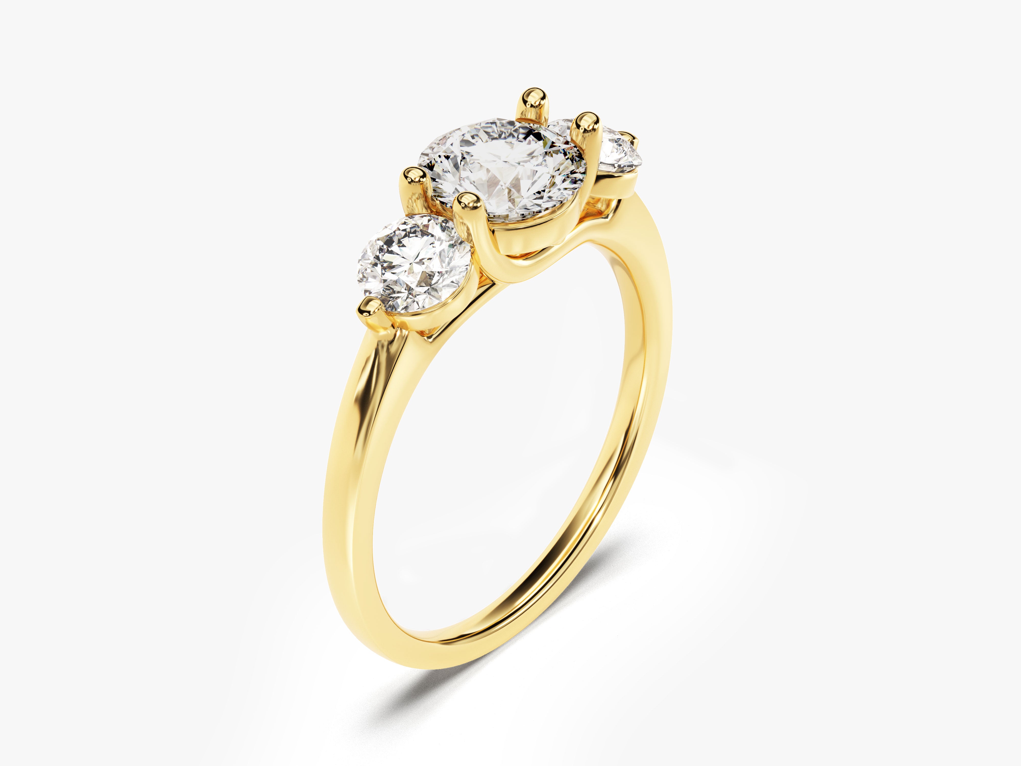 Gold three-stone diamond ring from jewelry company