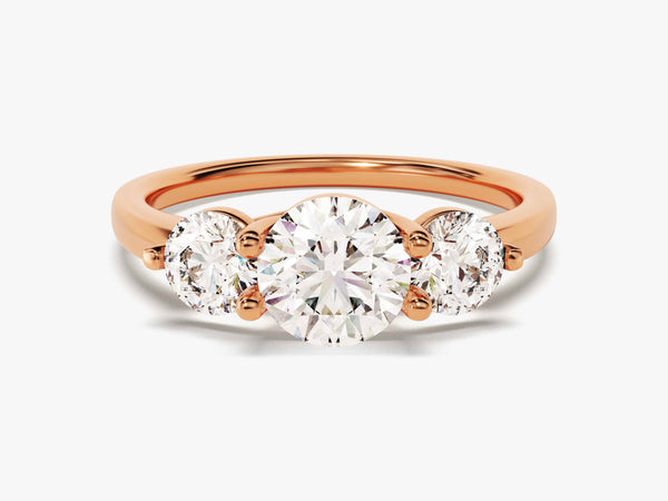 Rose gold three-stone diamond engagement ring jewelry