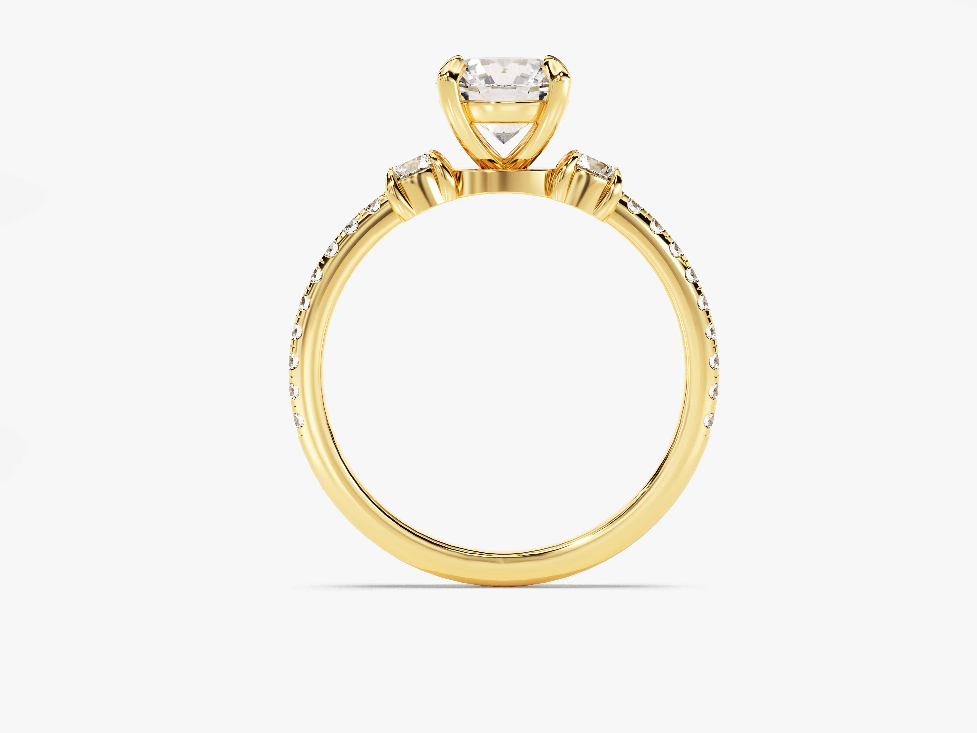 Gold diamond engagement ring with cushion cut center stone