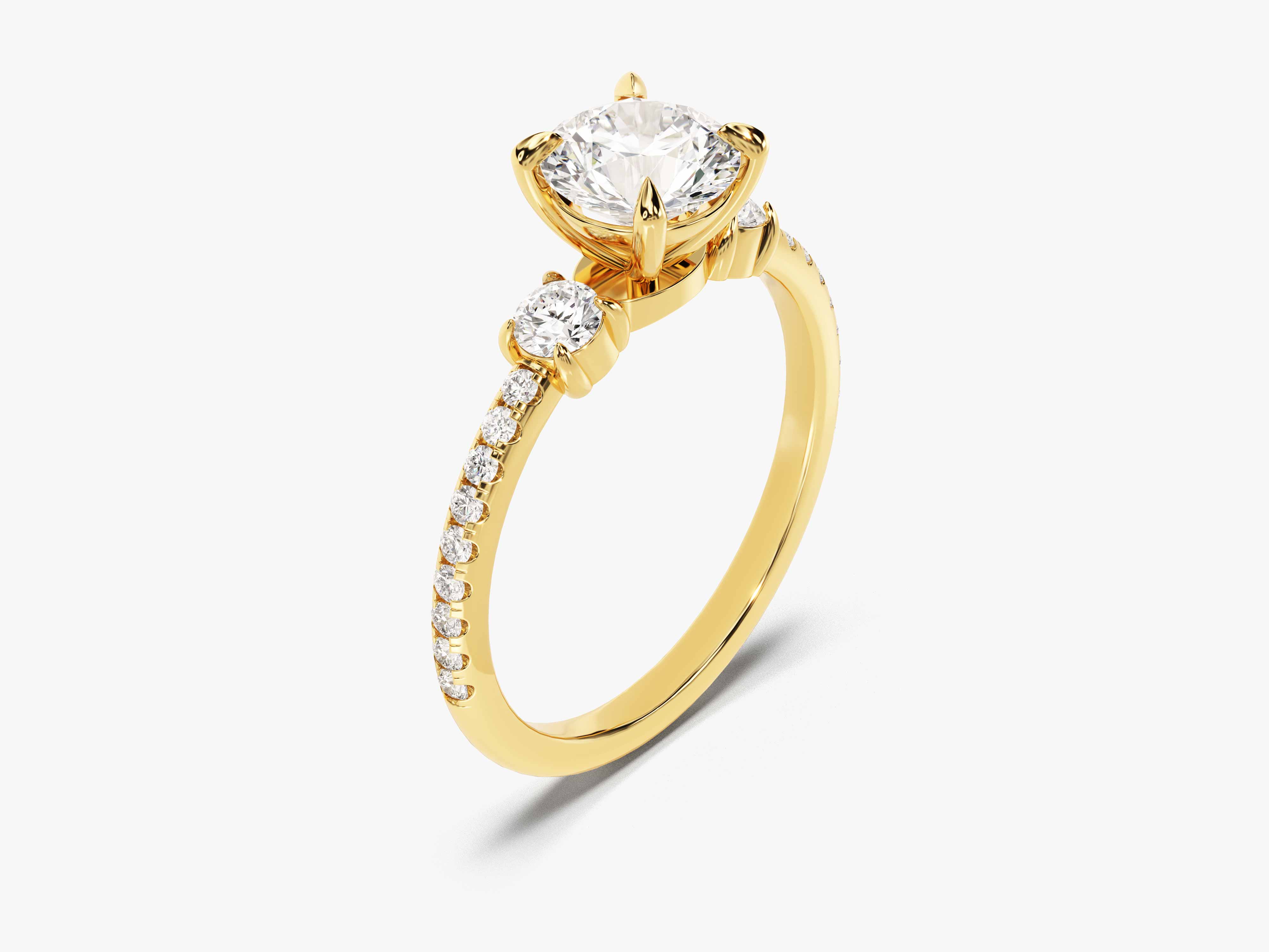Gold diamond ring with a prominent center stone and accent diamonds