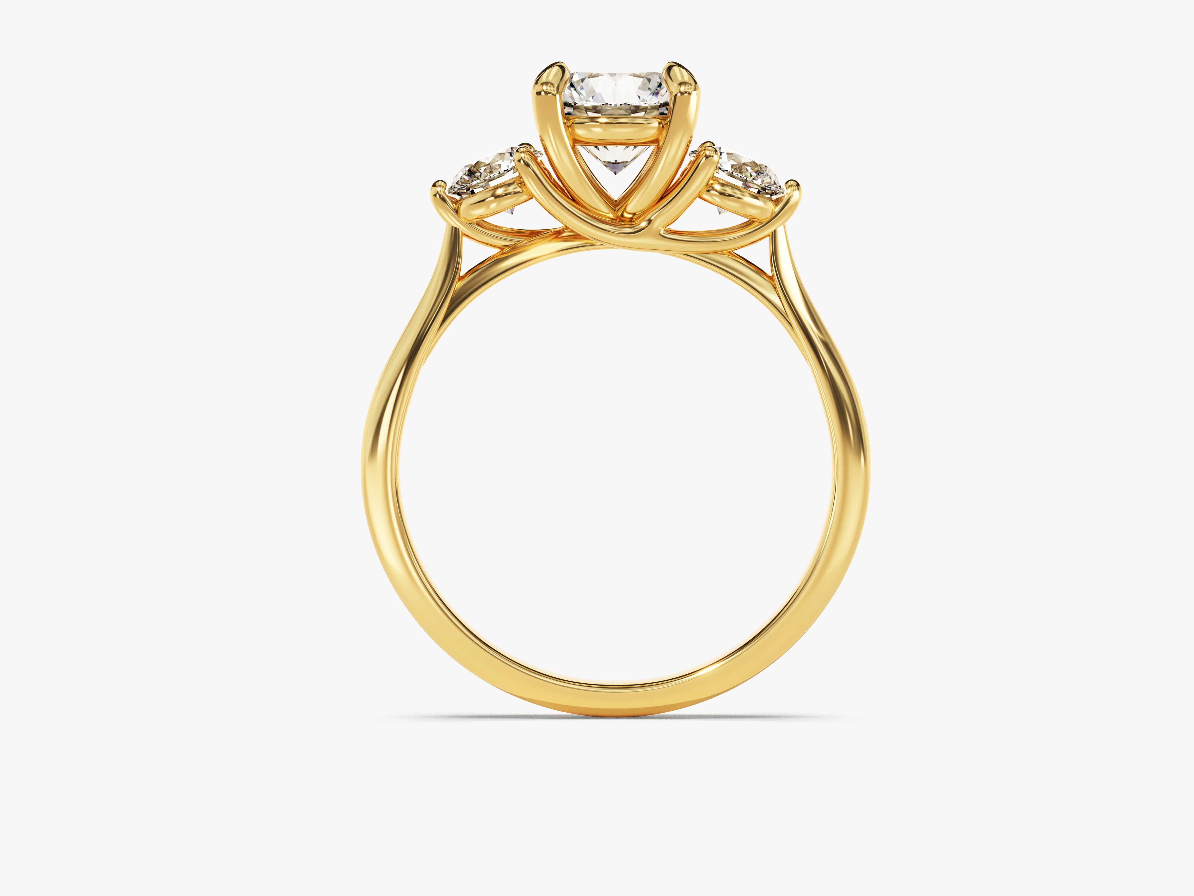 Gold three-stone diamond engagement ring