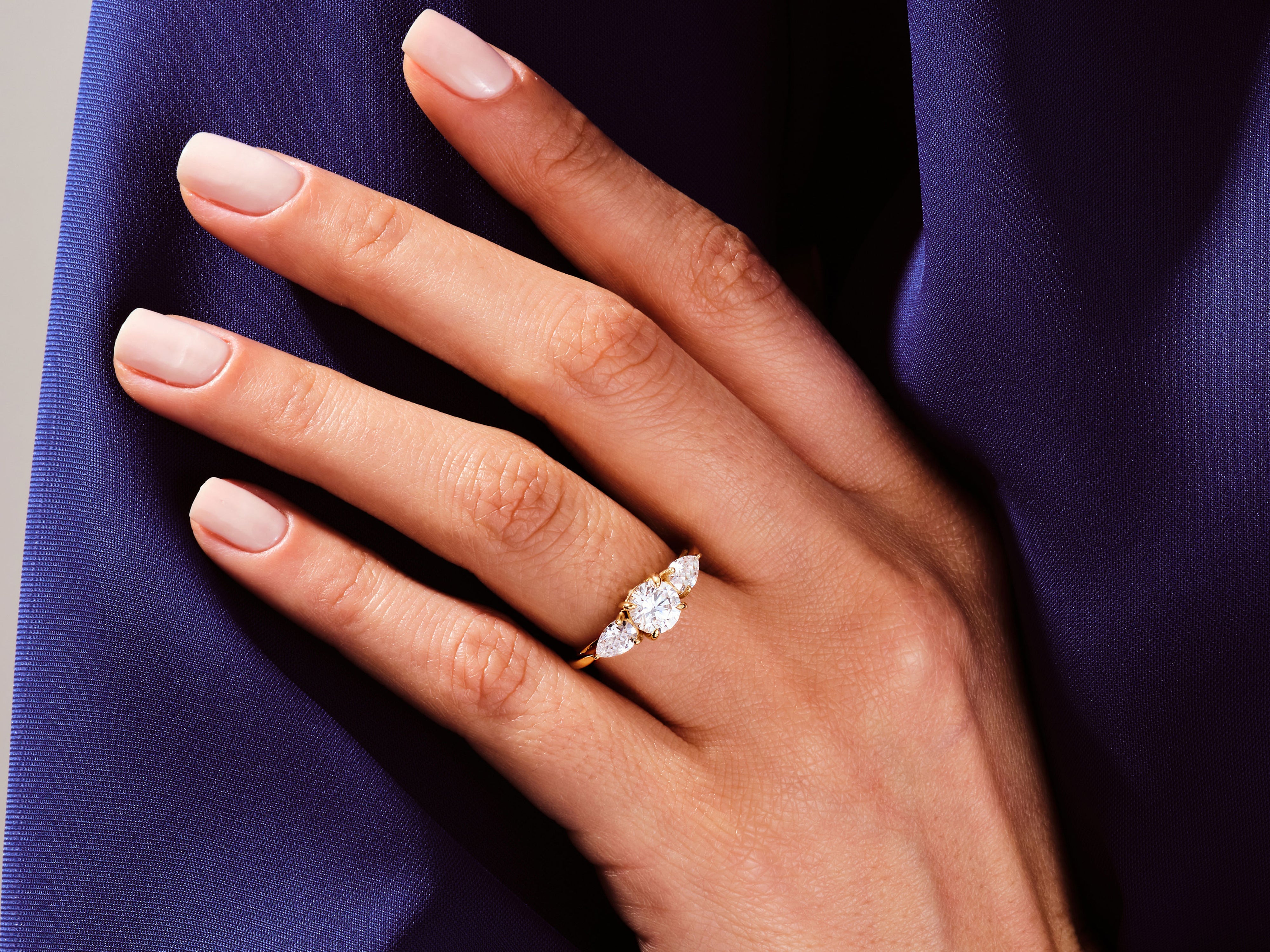 Diamond engagement ring on a hand, luxury jewelry