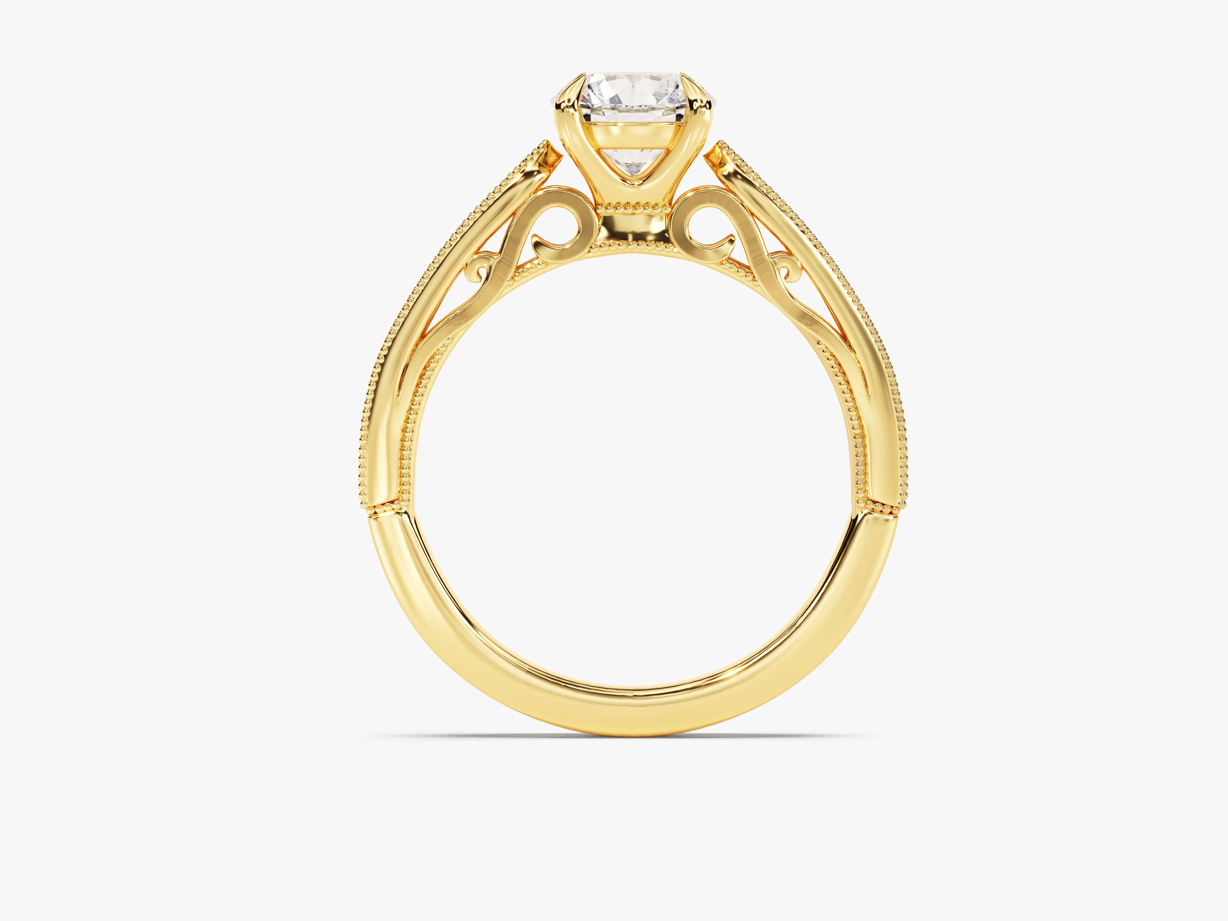 Gold diamond engagement ring with intricate band design