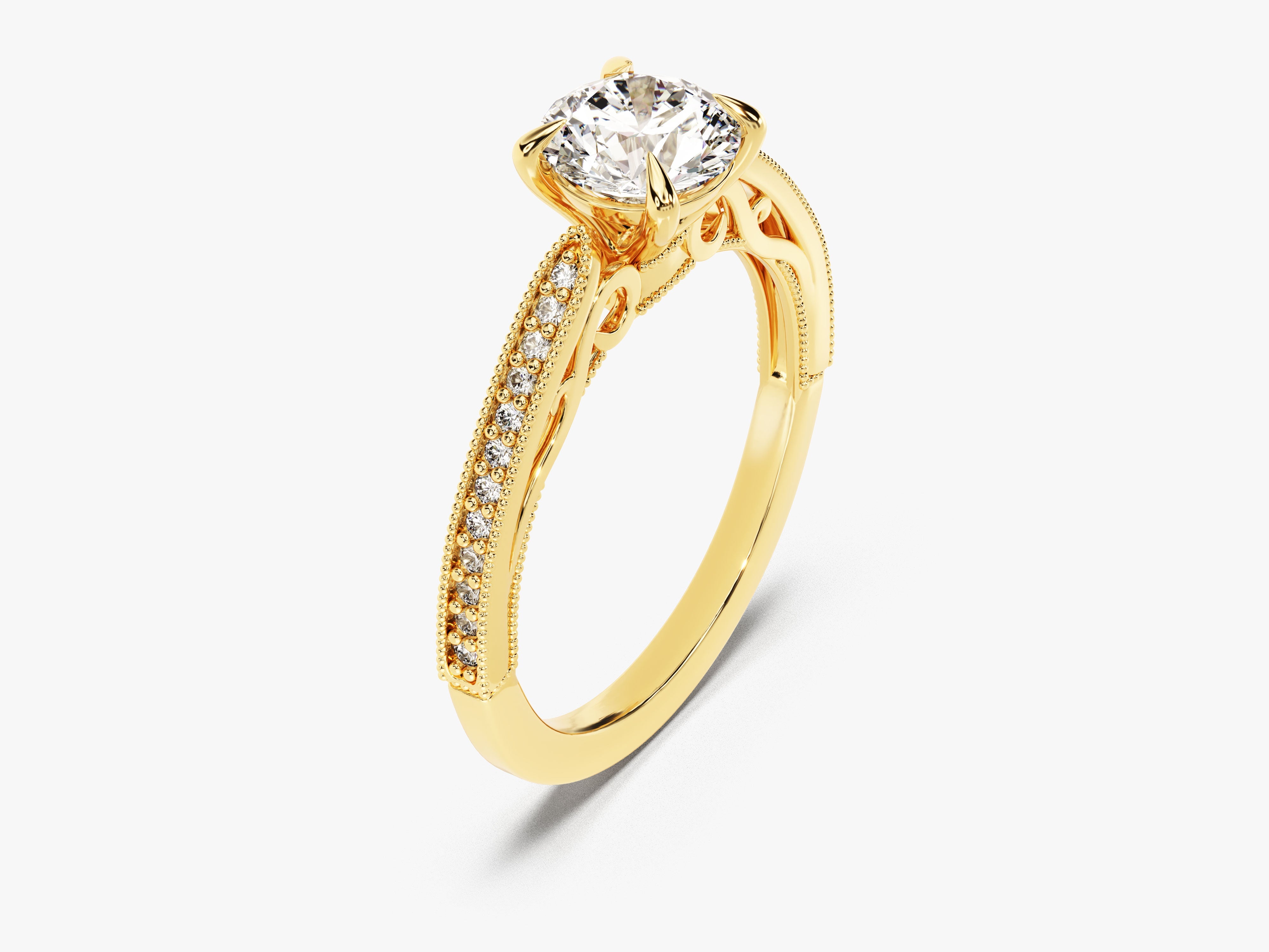 Gold diamond engagement ring with intricate band details
