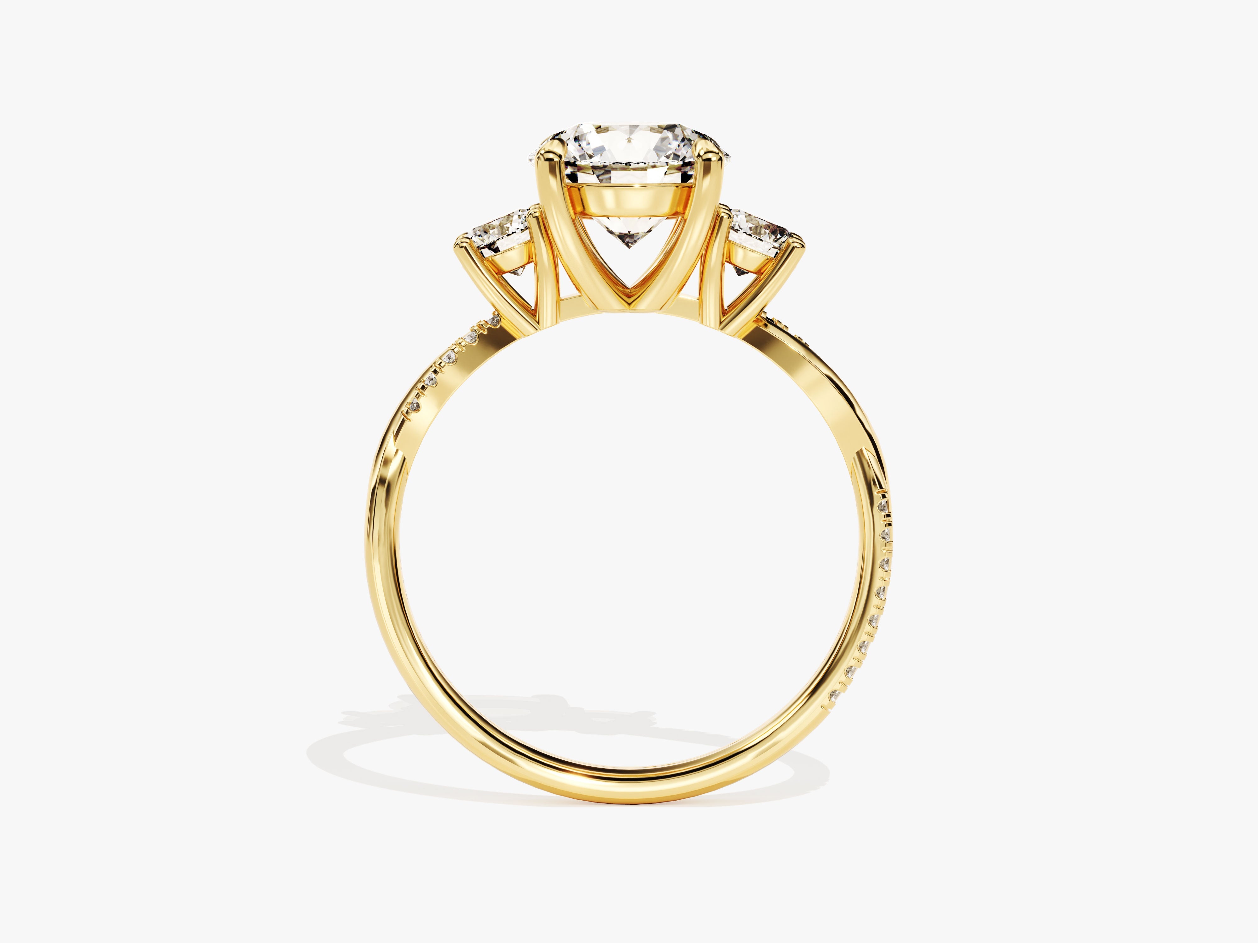 Gold three-stone diamond engagement ring