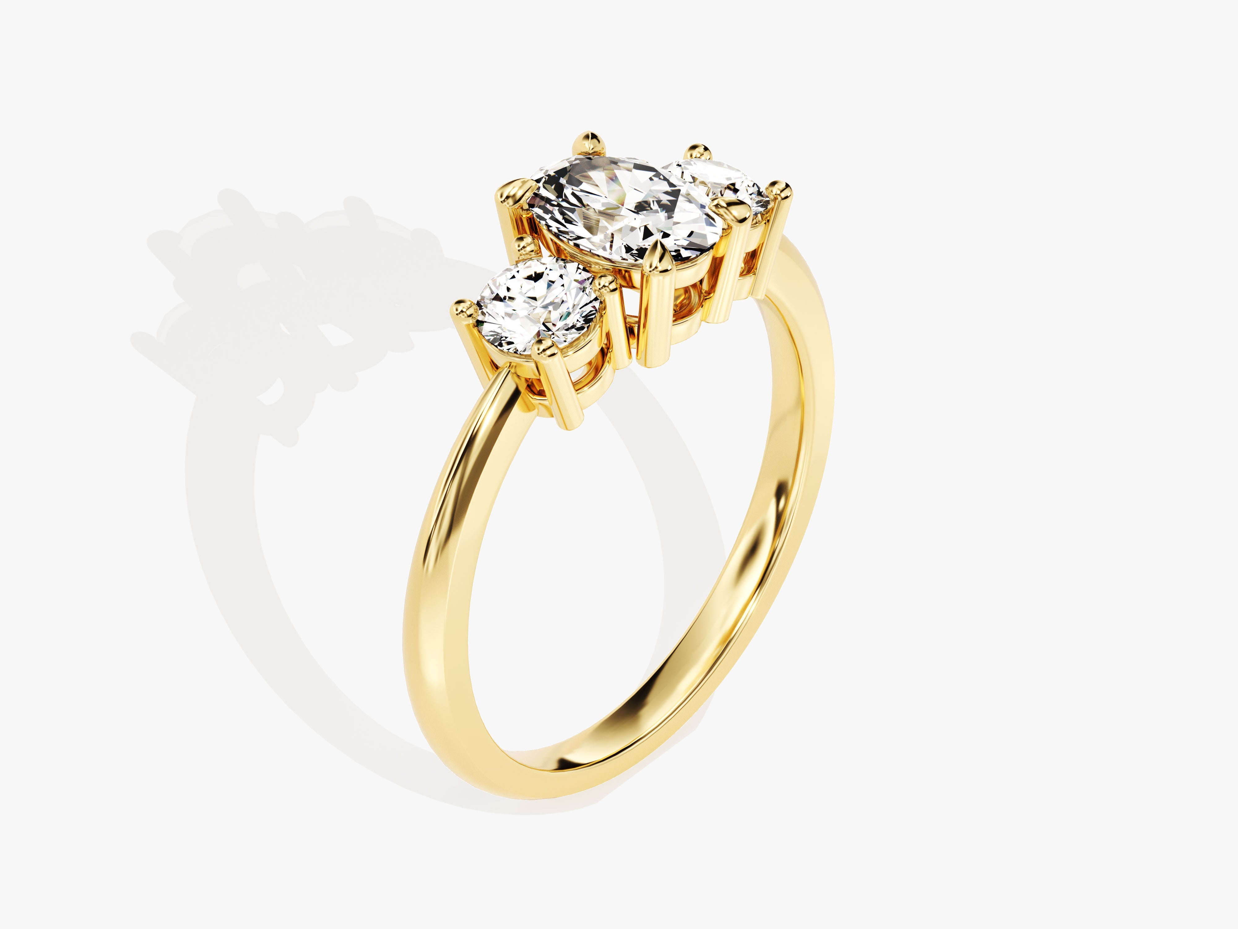 Gold three-stone diamond engagement ring from jewelry firm