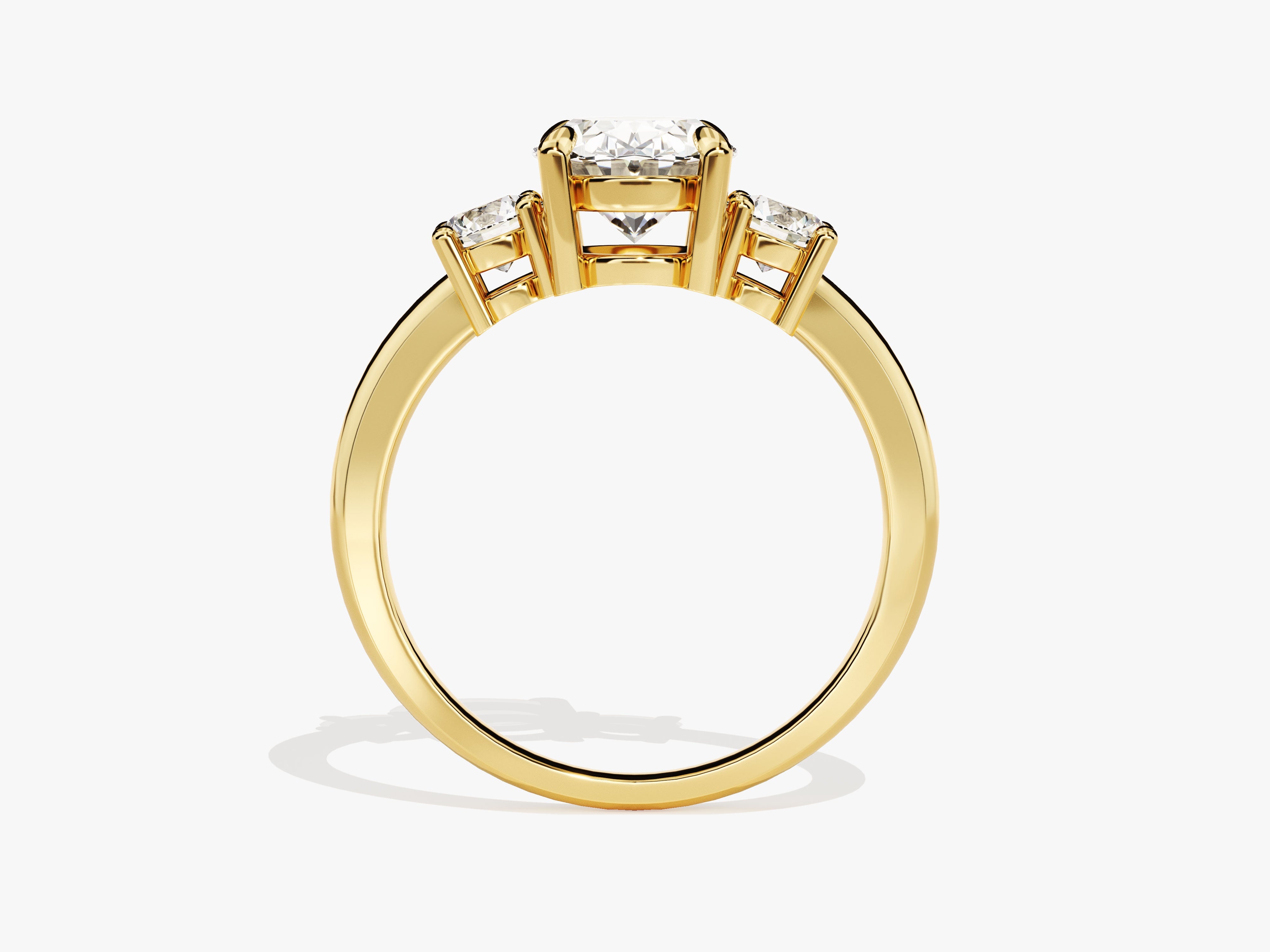 Gold three-stone diamond engagement ring for jewelry company